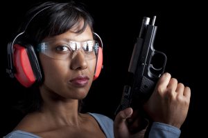 Woman shooting at indoor gun range at Las Vegas Shooting Center